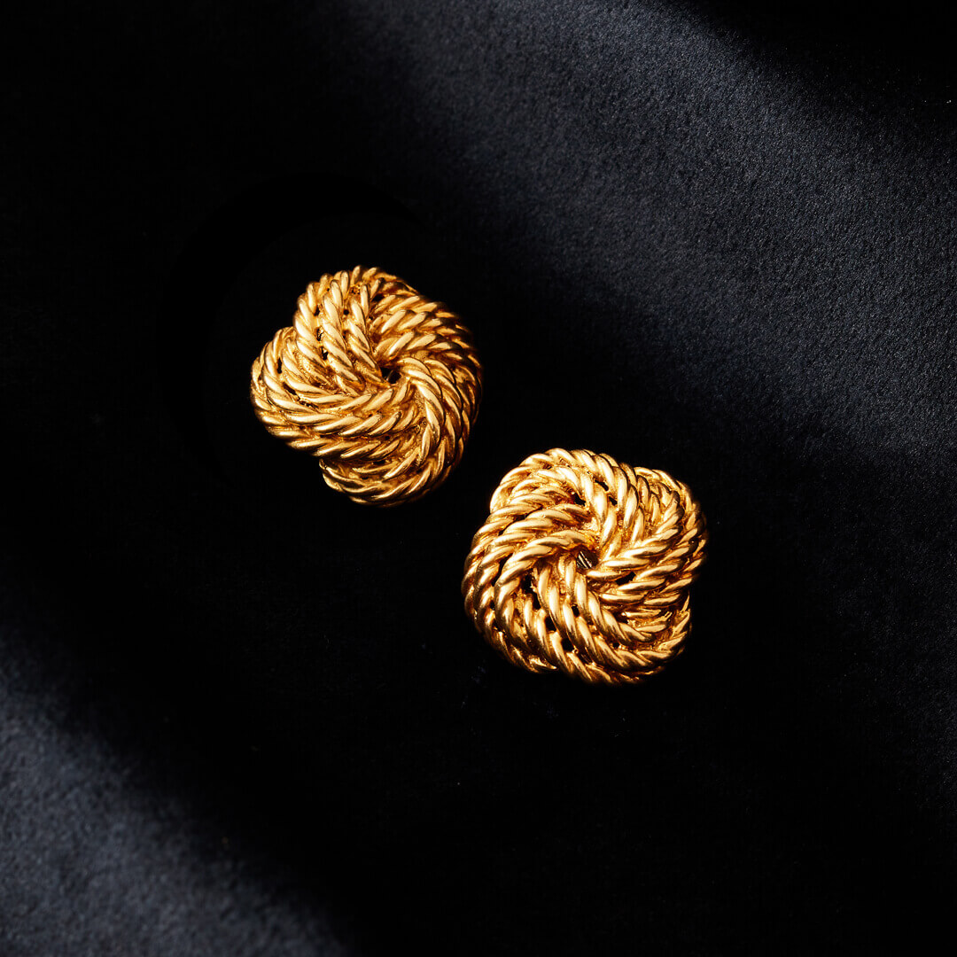 A pair of 18ct Gold Clip On Knot Earrings by Boucheron