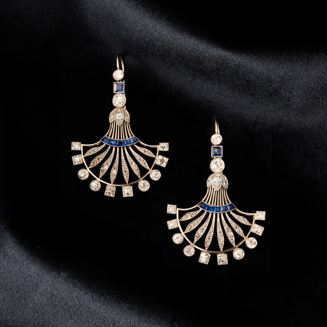 A pair of French Art Deco Platinum Fan Shaped Earrings set with Sapphires and Diamonds