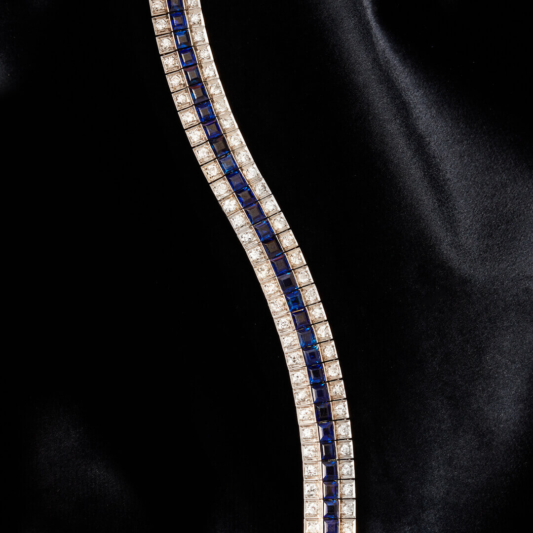 An Art Deco Platinum, Sapphire and Diamond Triple Line Cocktail Bracelet