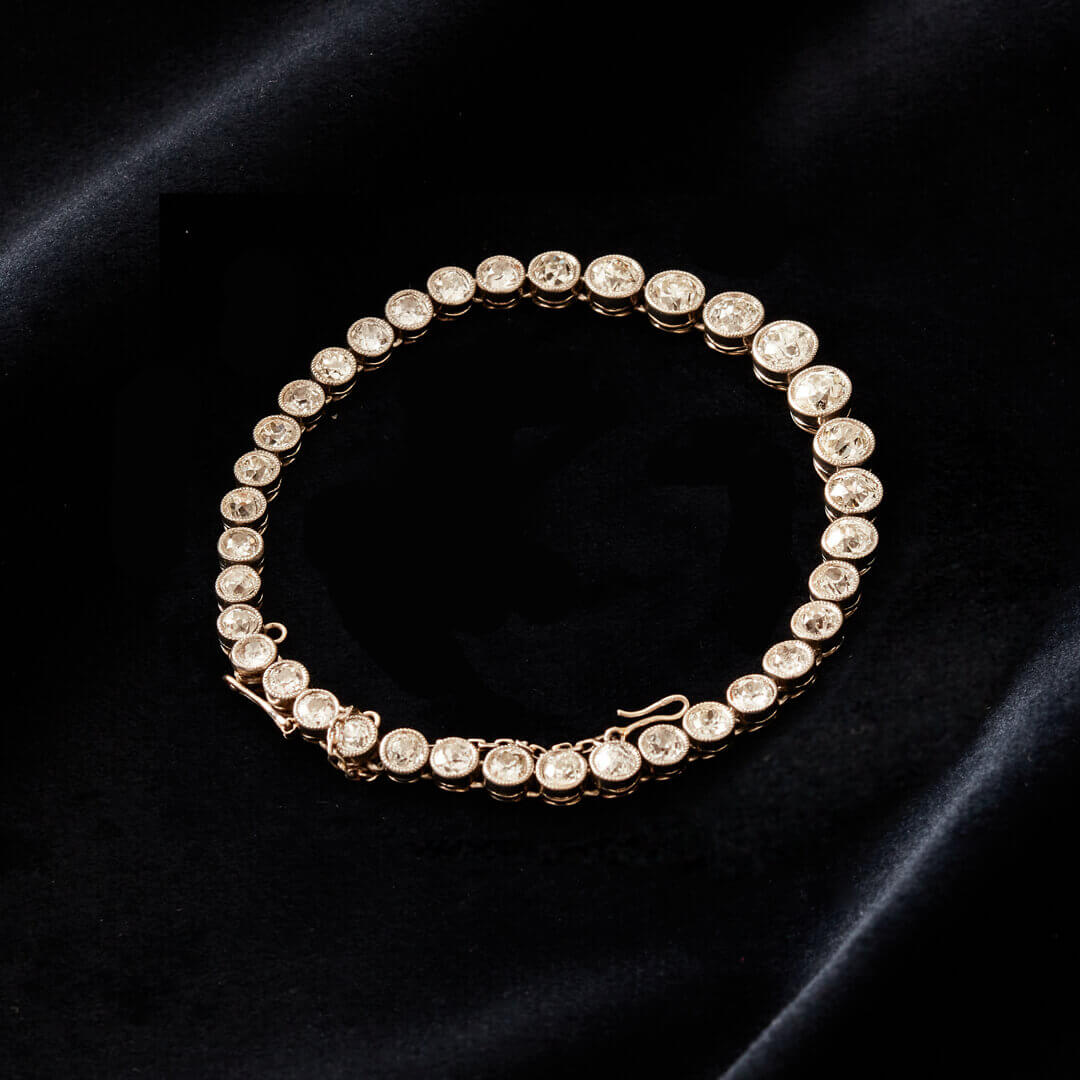 An Edwardian Platinum & Diamond Rivière Bracelet