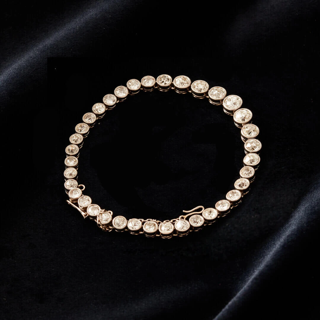 An Edwardian Platinum & Diamond Rivière Bracelet