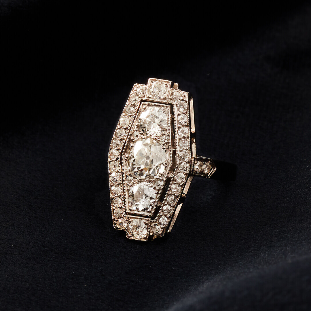 An Art Deco 18ct White Gold and Platinum, Diamond Geometric Ring