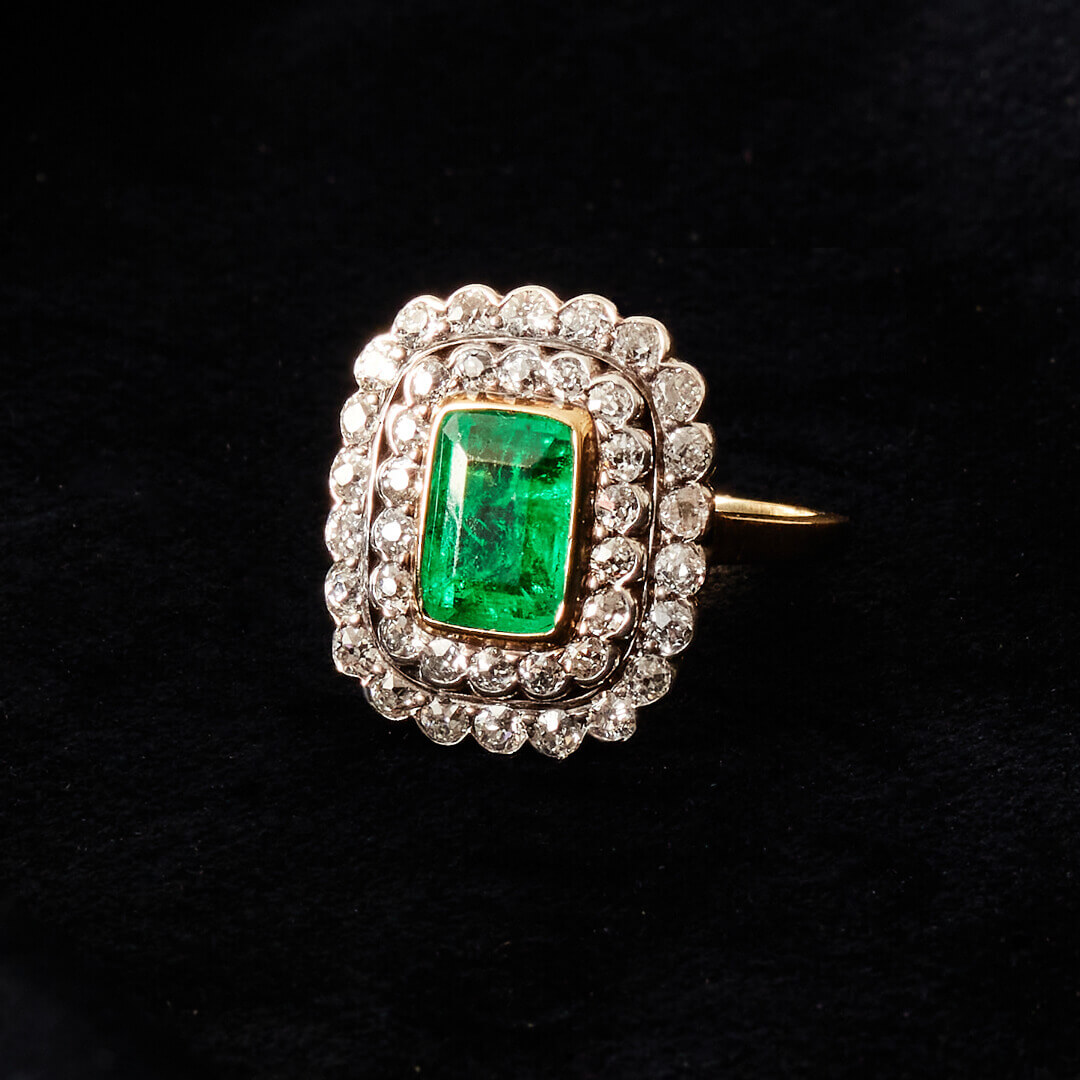 An Art Deco 18ct White & Yellow Gold Large Emerald and Diamond Cluster Ring