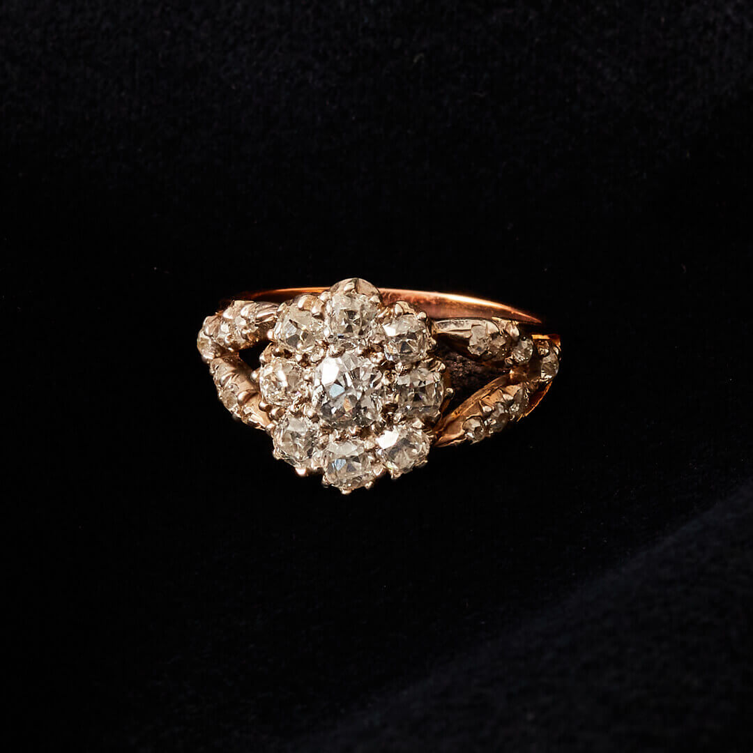 A Georgian Diamond Cluster Ring with Split Diamond Set Shoulders