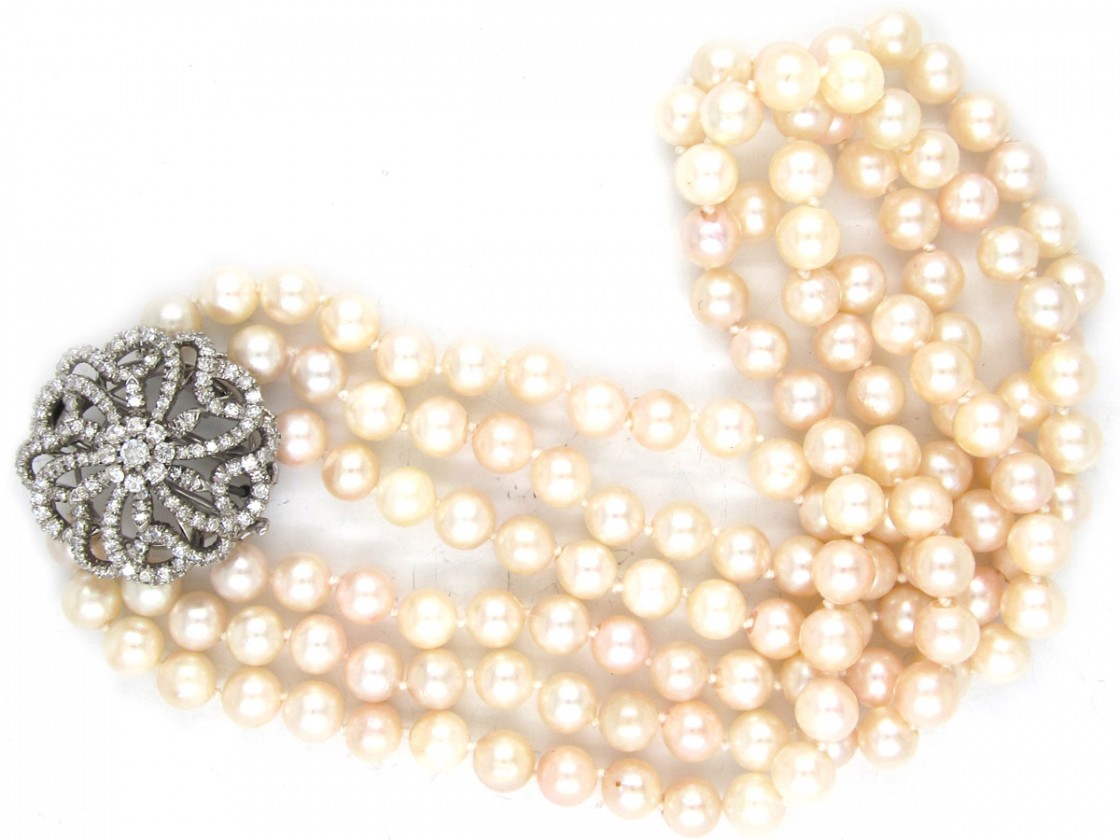 Cultured Pearl Three Strand Necklace with Large Diamond Set Flower Clasp The Antique Jewellery